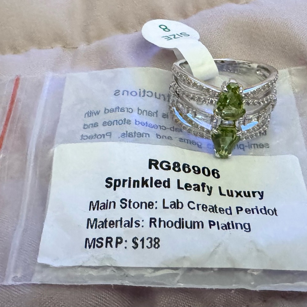 Sprinkled Leafy Luxury Silver Ring with Green Stone